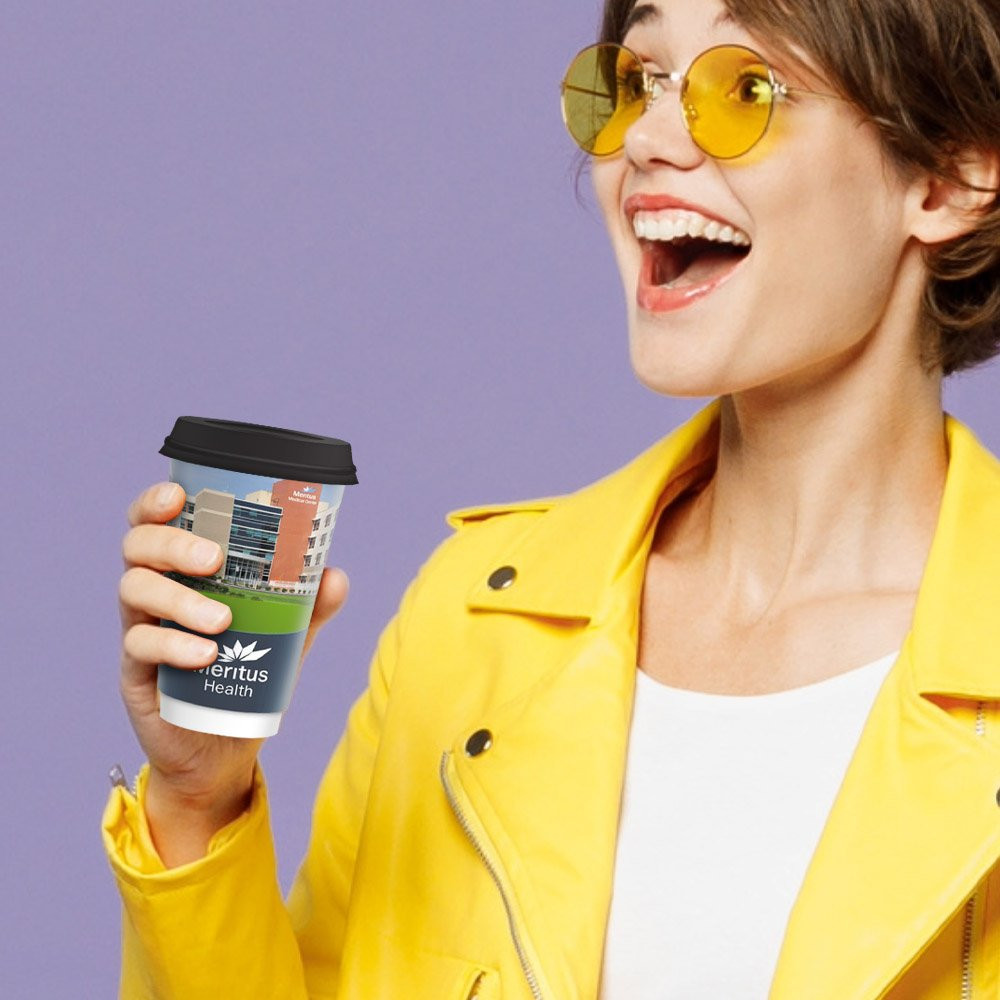 Women using her Double Wall Insulated Hot or Cold Recycled Paper Cup