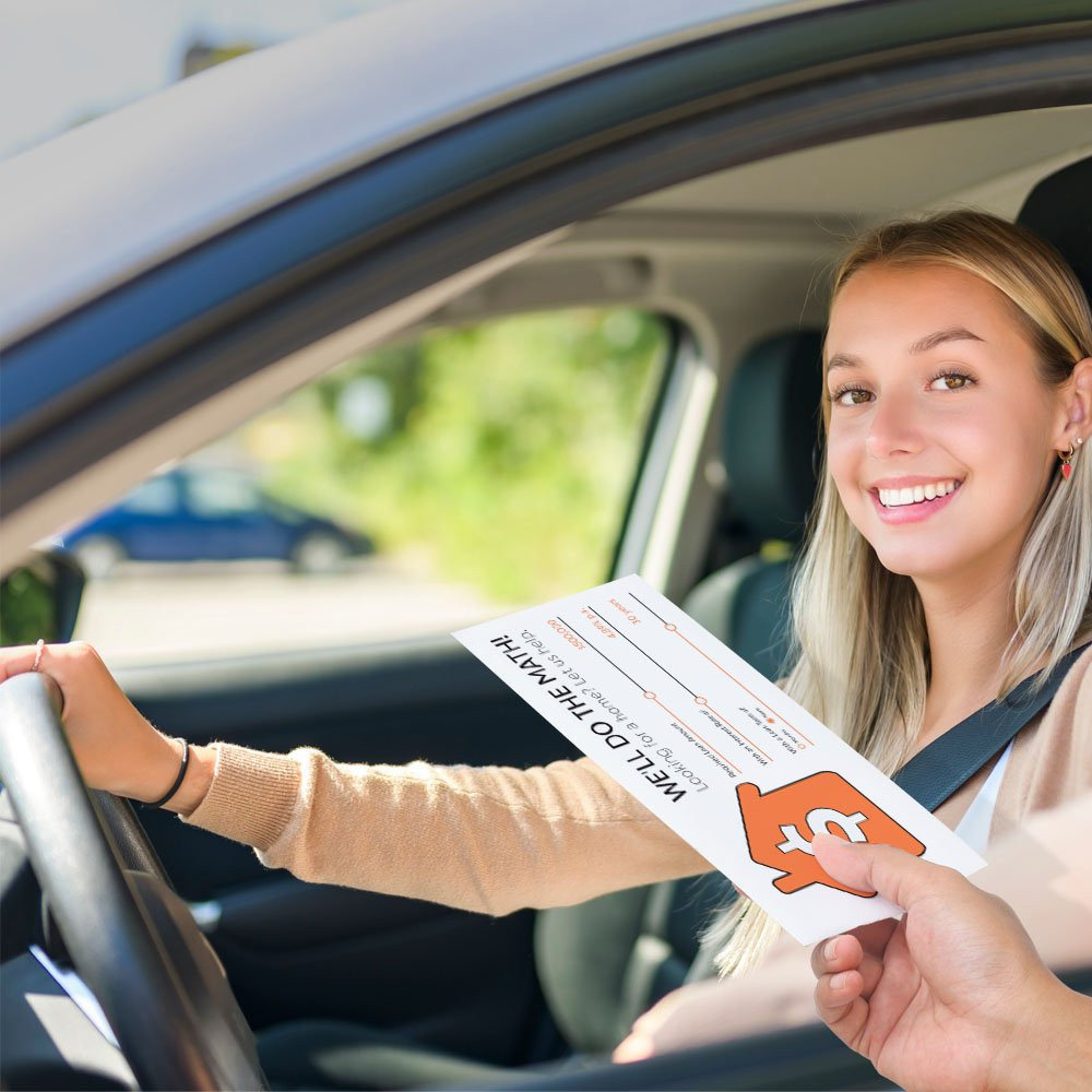 Drive up bank envelope in use with bank teller and banking customer 