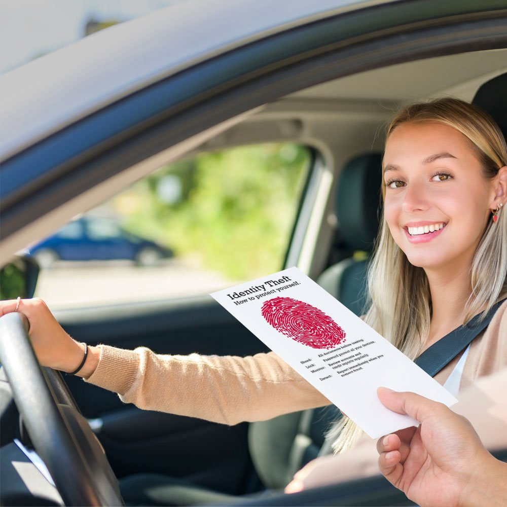 Drive thru money envelopes shown in use with bank teller and bank customer