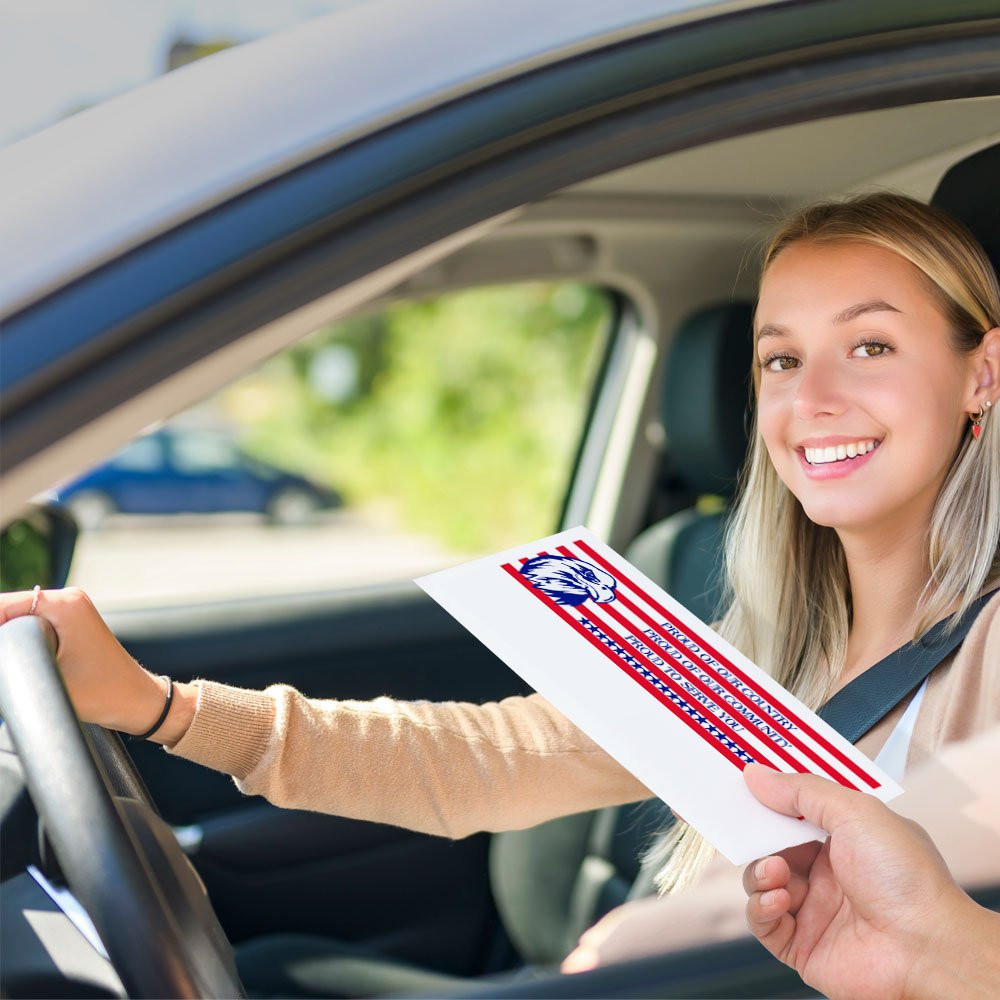 Drive thru money envelopes shown in use with bank teller and bank customer