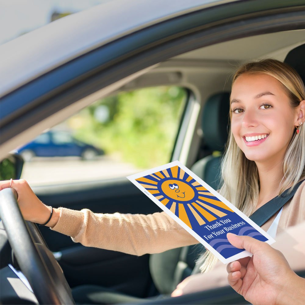 Drive up envelope in use with bank teller and banking customer