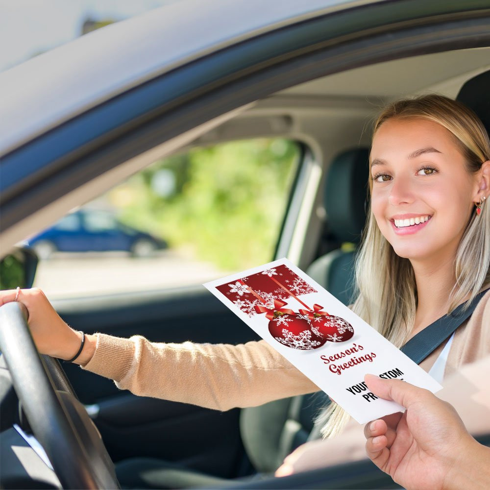 Drive up bank envelope in use with bank teller and banking customer 
