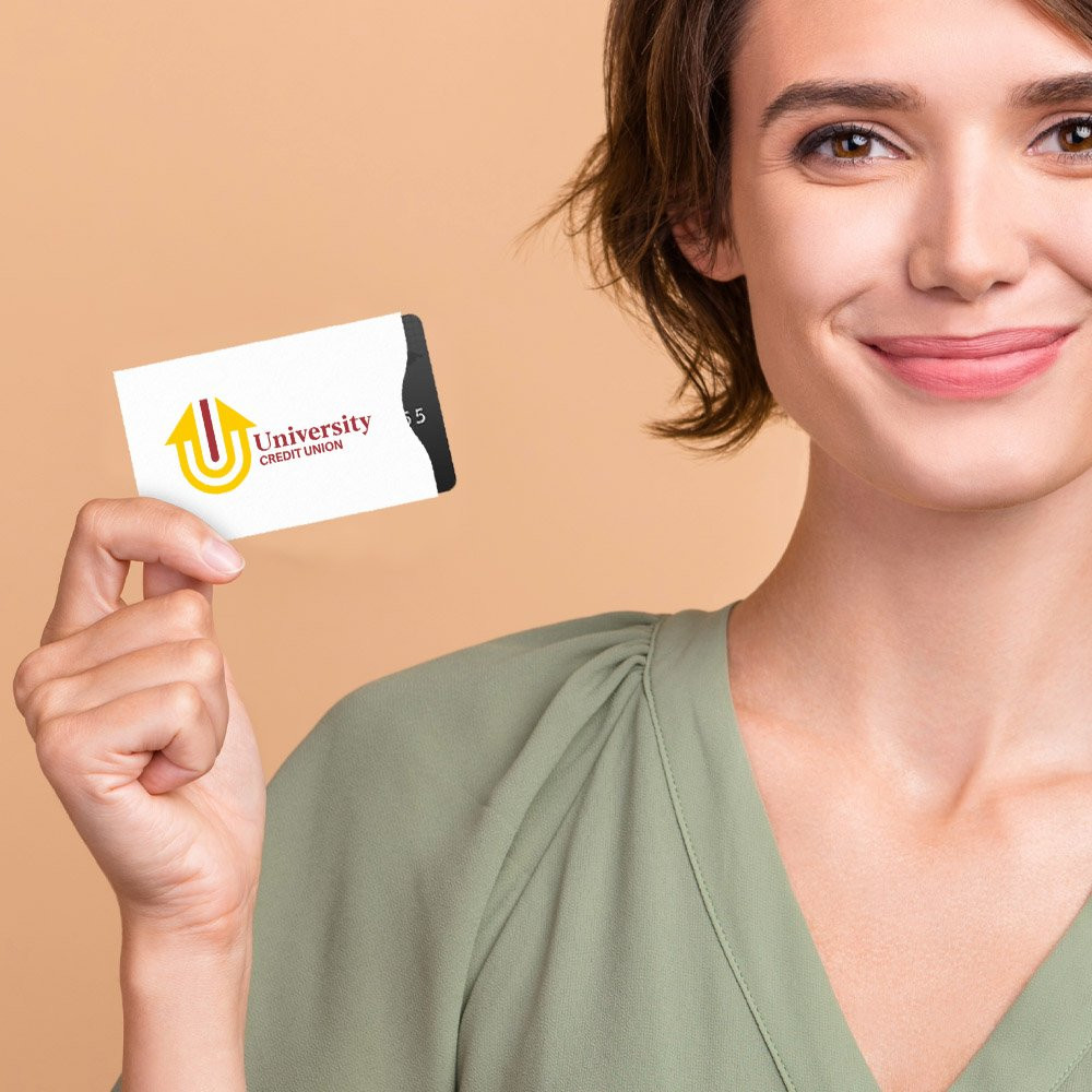 Woman holding 2-color imprinted Paper Tyger®/Guardian® RFID Card Sleeves