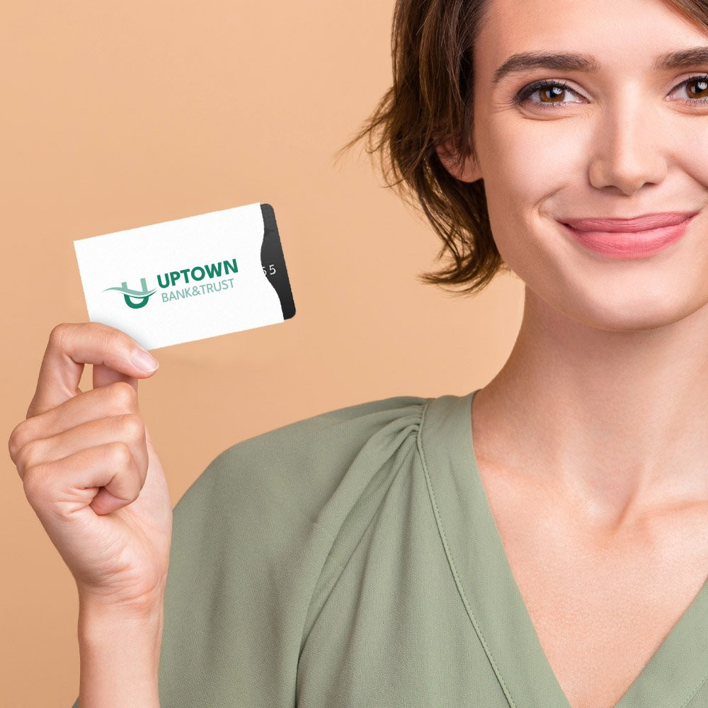 Woman holding 2-color imprinted Tyvek® Card Sleeves