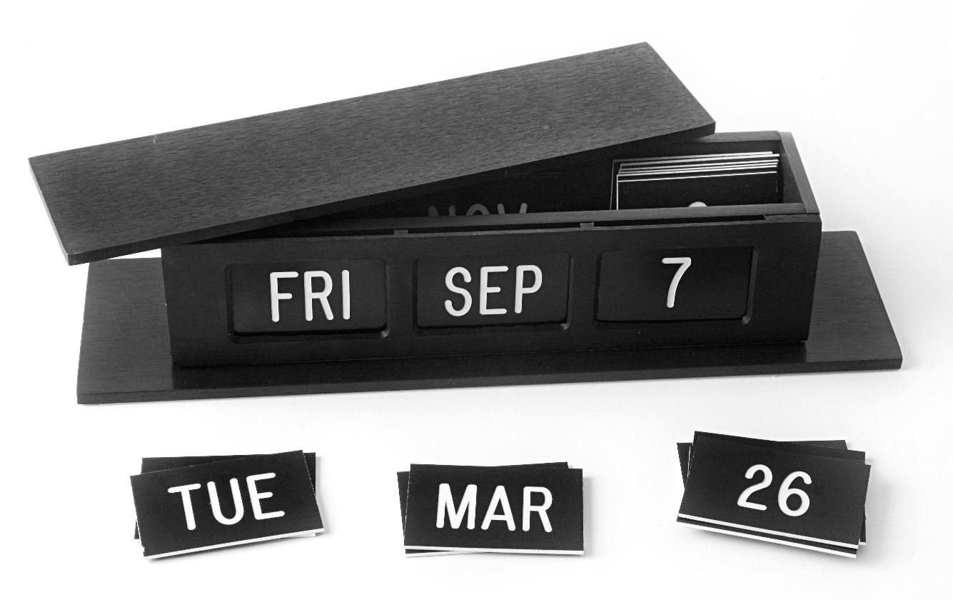 Self-Storing Perpetual Calendar with Tile Storage Shown in Black with Black insert and White Text