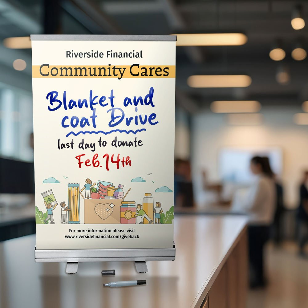 Tabletop economy retractor banner kit shown in use at a credit union