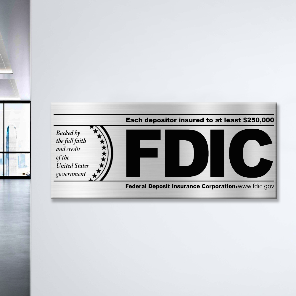 FDIC $250000 Wallmount Plaque- Silver w/ Black Text Shown Displayed on the wall