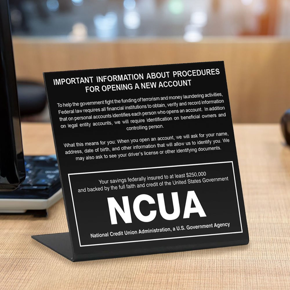 Patriot act with NCUA insignia - Matte black easel style sign - In use 
