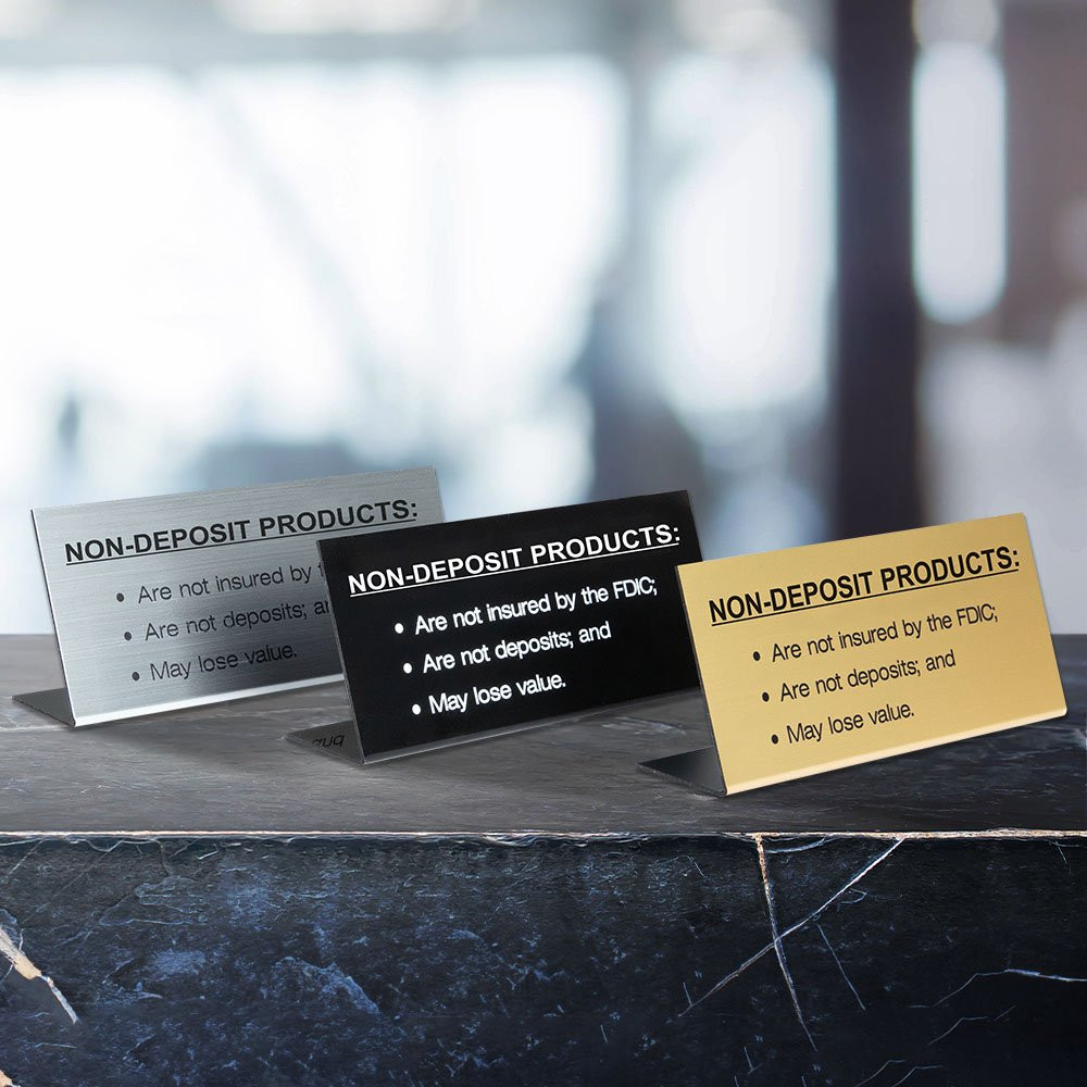 Non-Deposit Products Bend Back Counter Signs sitting on a countertop