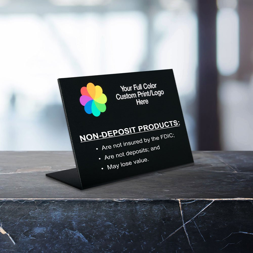 Non-Deposit Products Bend Back Counter Sign in use on desk - Full color logo - Black background with white text 