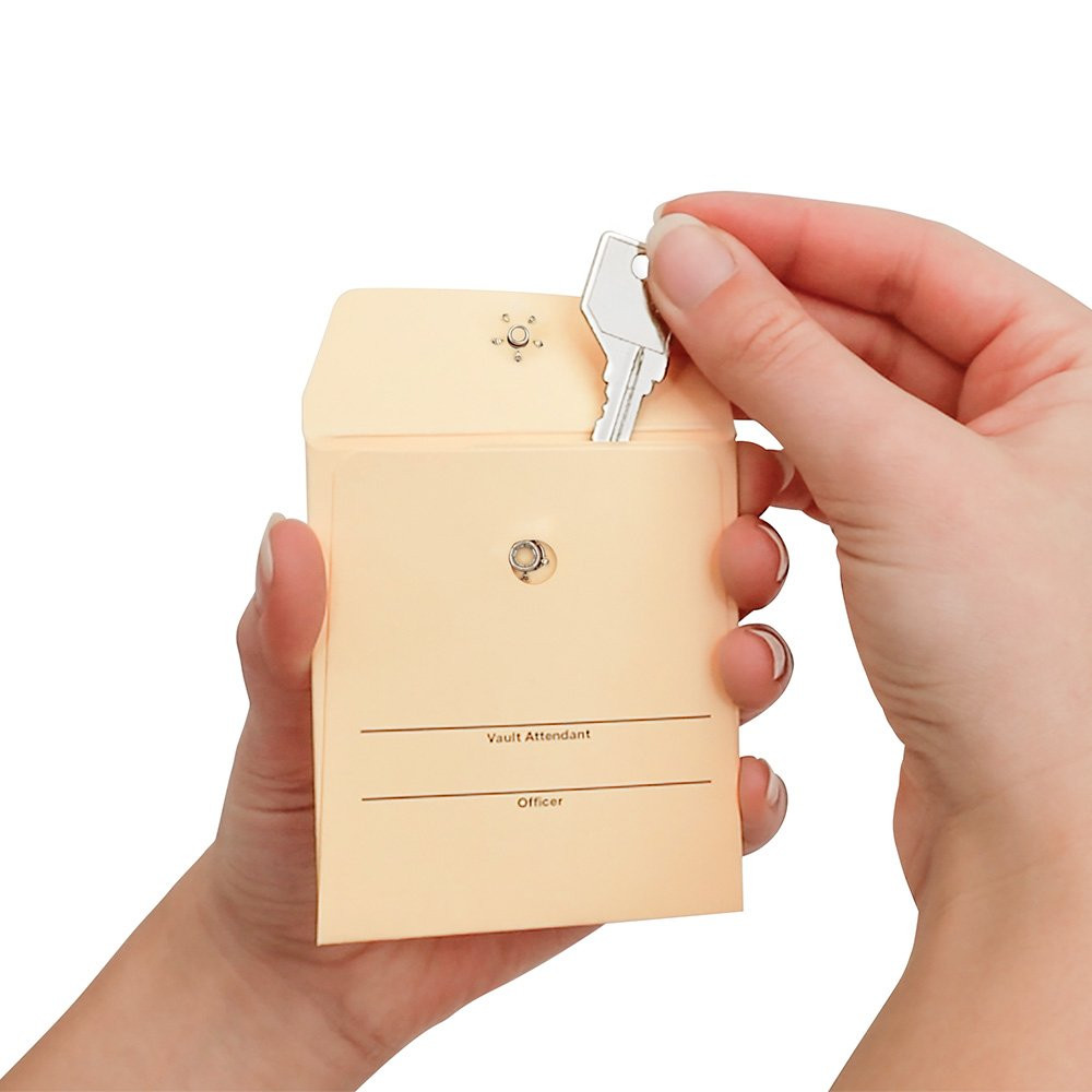 3W x 3-1/2H  Manila Key Envelopes Shown In Use 