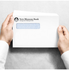 Custom Statement Envelopes shown in use. Person holding envelope 