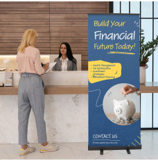 Economy Retractor Banner shown in the 31.5 inch size in use at bank with teller and customer