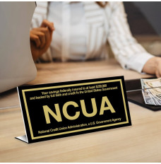 Bent teller sign - NCUA - Black with gold text - In use  
