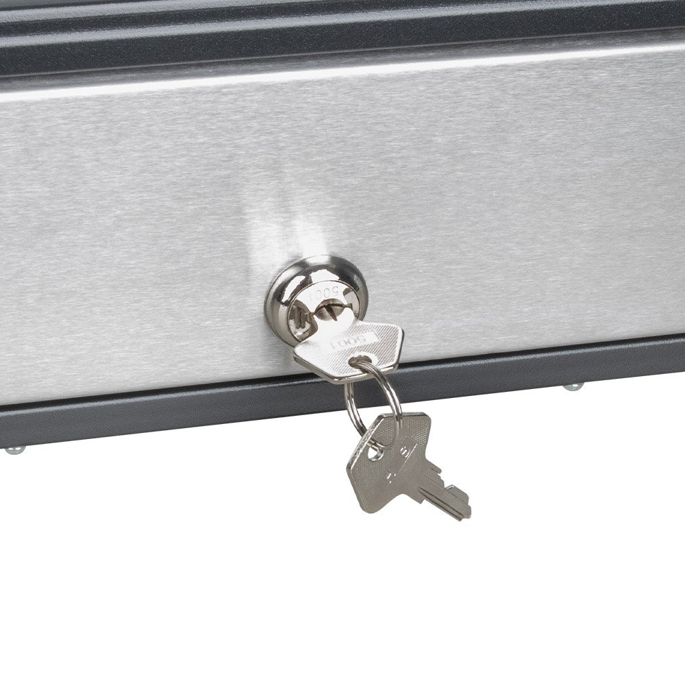 Up close view of cash drawer lock and key inserted into lock