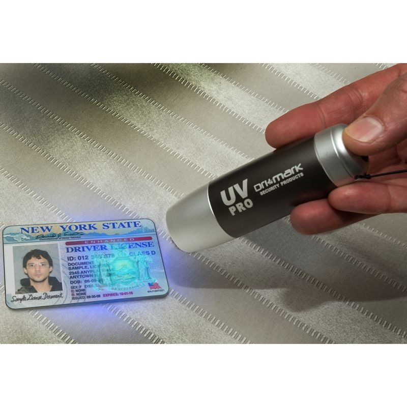 DriMark Tethered UV Counterfeit Detector Light - scanning a drivers license