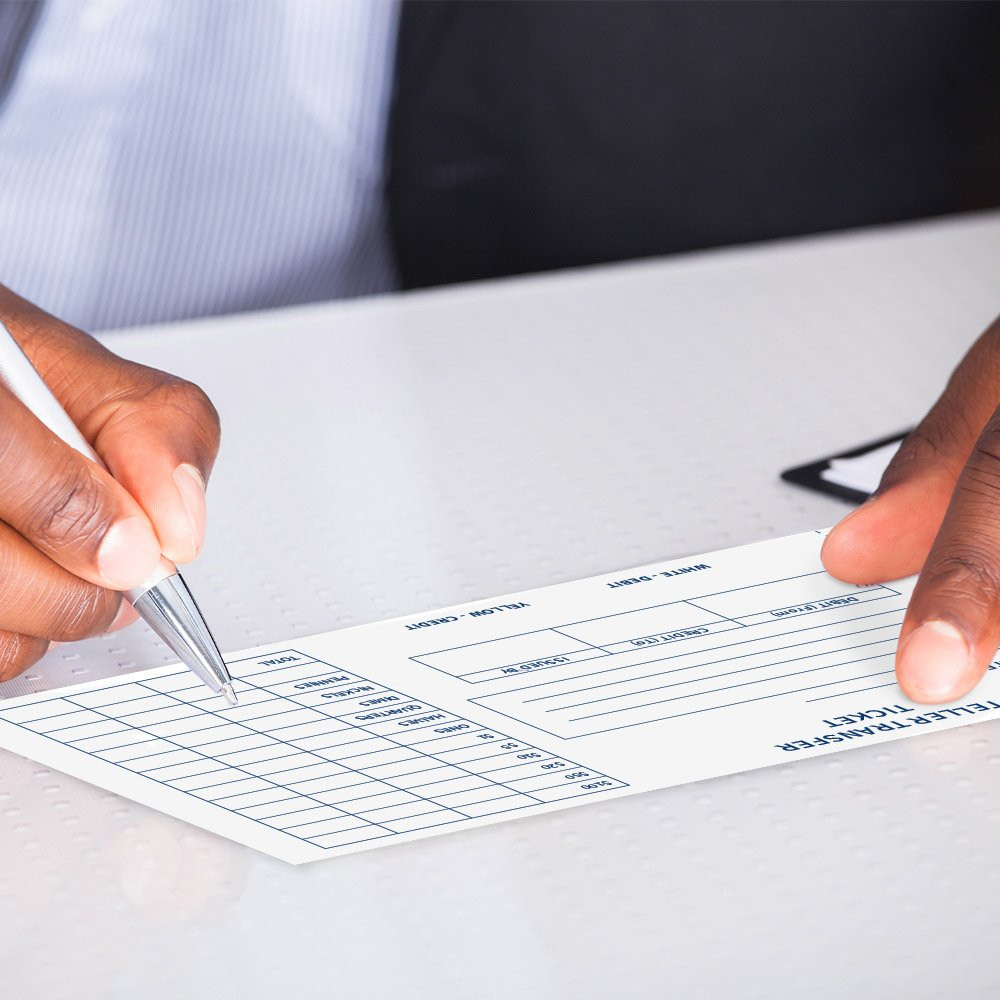 Teller Transfer Ticket - 2-part forms in use on desk